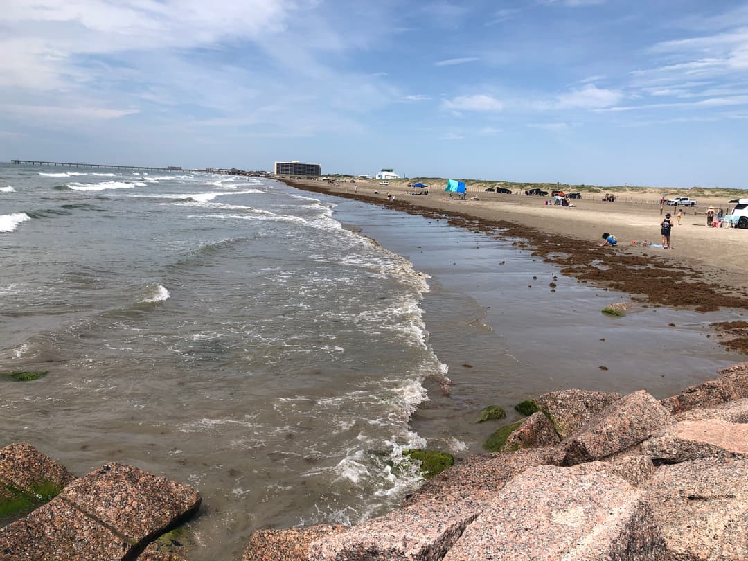 Port Aransas jetty at the ship channel entrance — pelicans and Gulf view