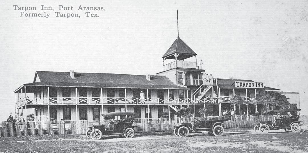 Historical postcard of the Tarpon Inn Port Aransas Texas — Formerly Tarpon, Tex. — early 1900s automobiles