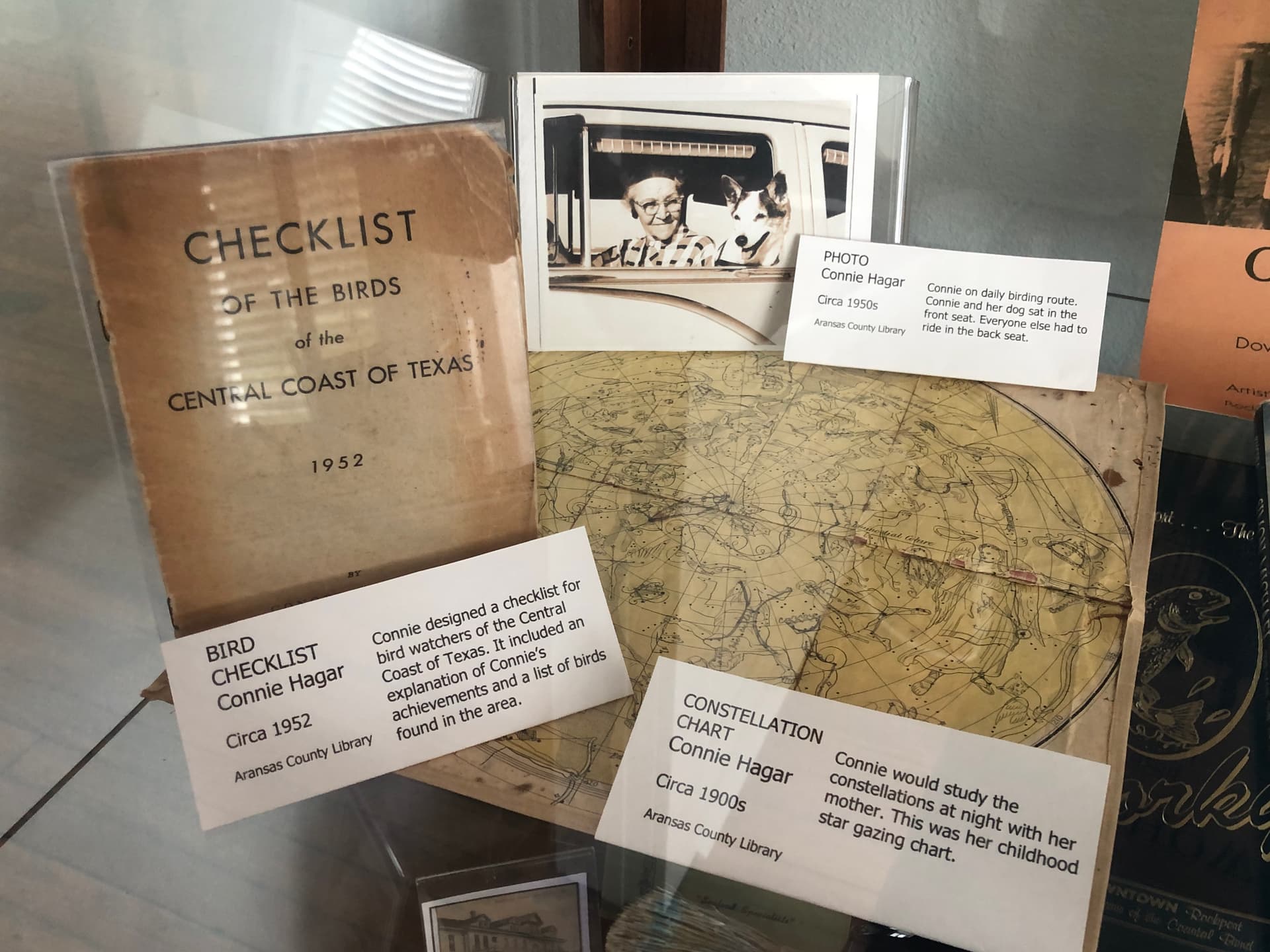 Connie Hagar exhibit — 1952 Bird Checklist, photo, and constellation chart