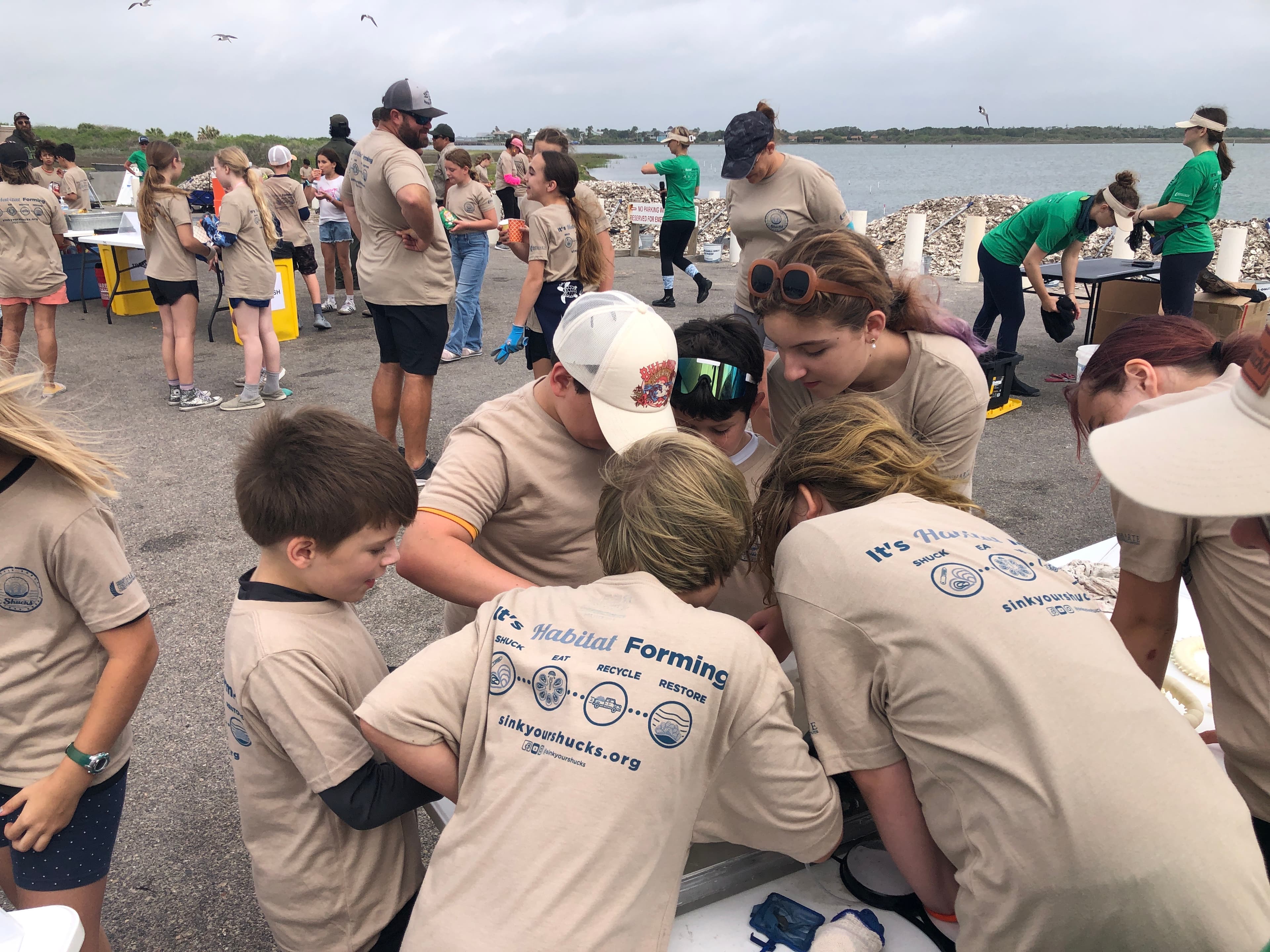 Students participating in oyster reef restoration at Goose Island State Park Rockport Texas